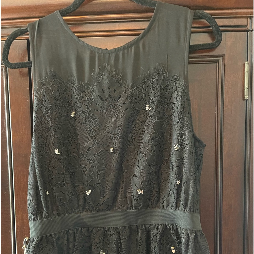Anthropologie Black Lace Peplum Top. Size large. Excellent condition.